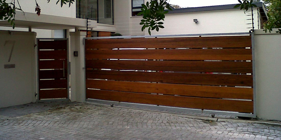 Horizontal slatted wide plank meranti sliding & pedestian gates