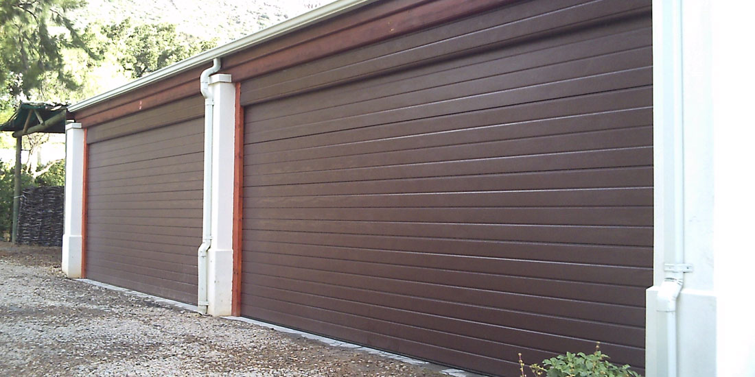 2 x double brown horizontal slatted aluzinc sectionals with false headers
